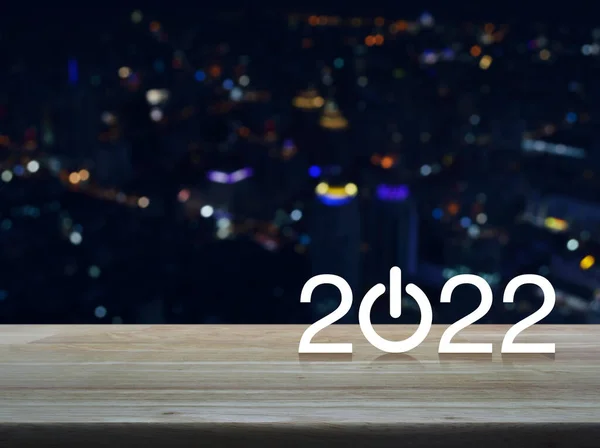 2022 Start Business Flat Icon Wooden Table Blur Colorful Night — Stock Photo, Image