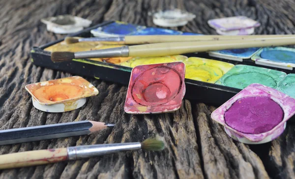 Vatten färg rutan och paint pensel — Stockfoto