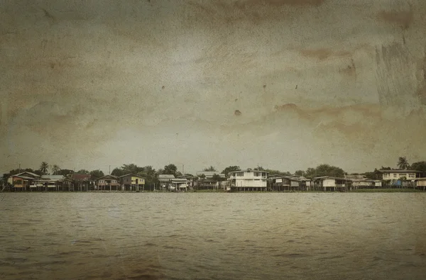 Rural riverfront house in Thailand, vintage style — Stock Photo, Image