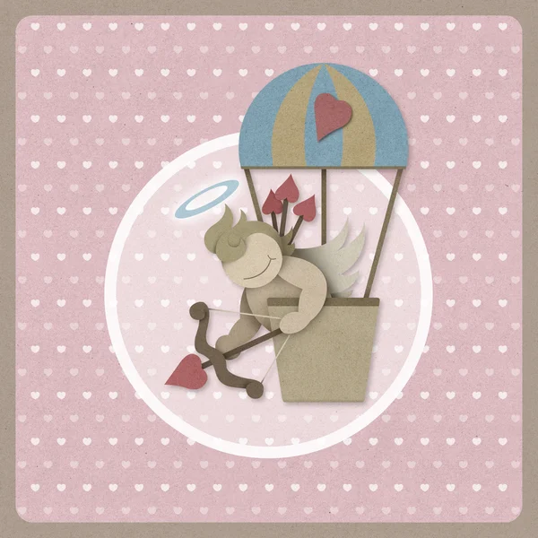 Cupid shoot bow in hot air balloon retro background, recycled pa — Stock Photo, Image