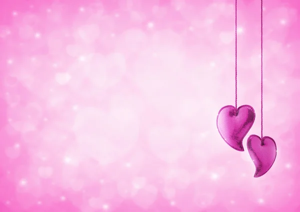 Hart liefde speelgoed op vervagen roze hart bokeh voor Valentijnskaart — Stockfoto