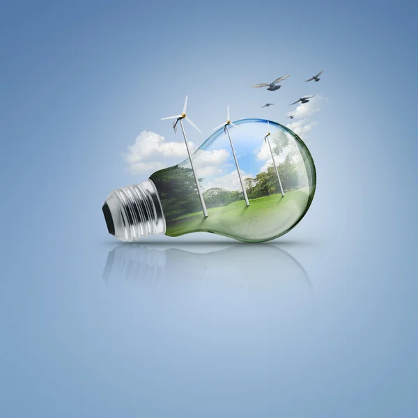 Light bulb with windmill and forest inside, Ecological concept — Stock Photo, Image
