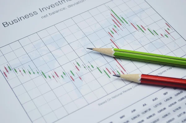 Pencil on business graph, stock market concept — Stock Photo, Image