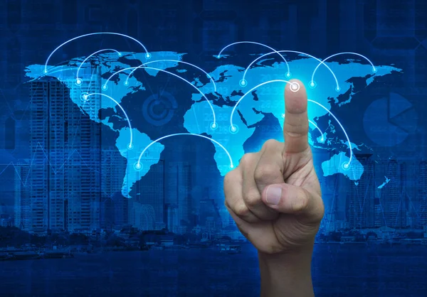 Finger touching on the touch screen with world map and city back — Stock Photo, Image