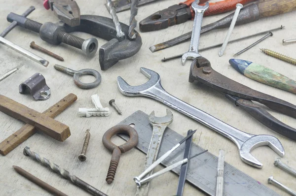 Assorted old work tools on wooden — Stock Photo, Image