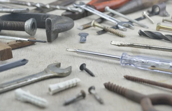 Assorted old work tools on wooden — Stock Photo, Image