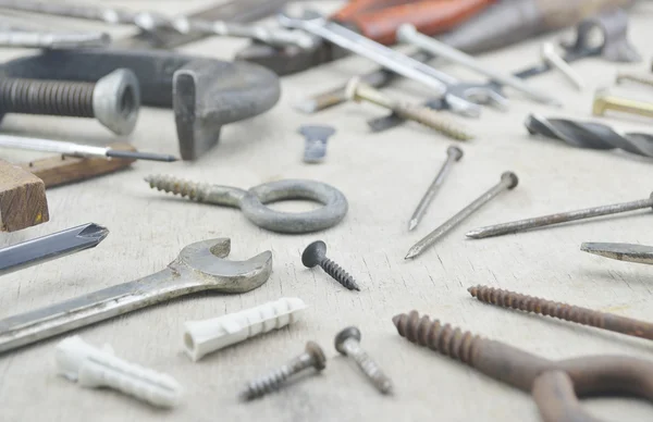Assorted old work tools on wooden — Stock Photo, Image