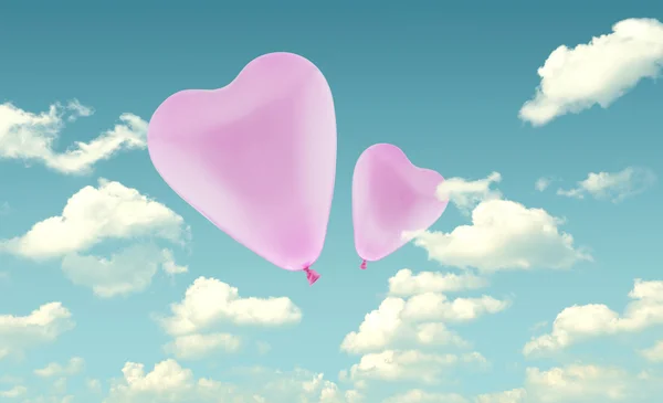 Rosa love heart ballon auf blauem himmel hintergrund, valentine concep — Stockfoto