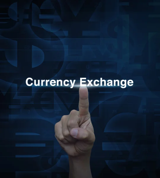 Mano presionando dólar palabra de cambio de moneda en moneda azul bac — Foto de Stock