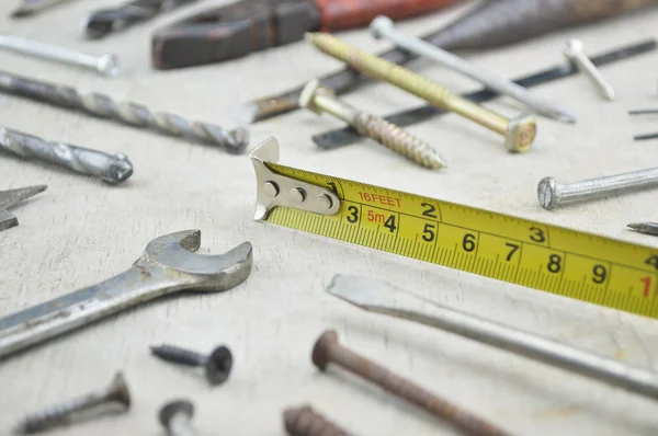 Assorted old work tools on wooden — Stock Photo, Image