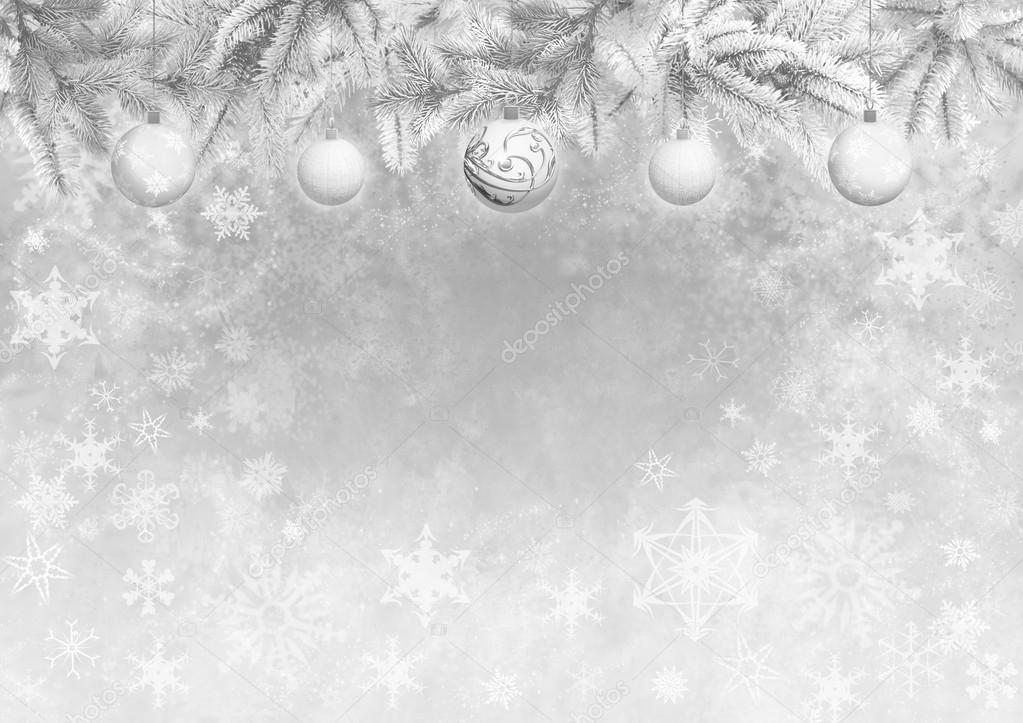 Gray color background with Christmas tree branches decorated balls