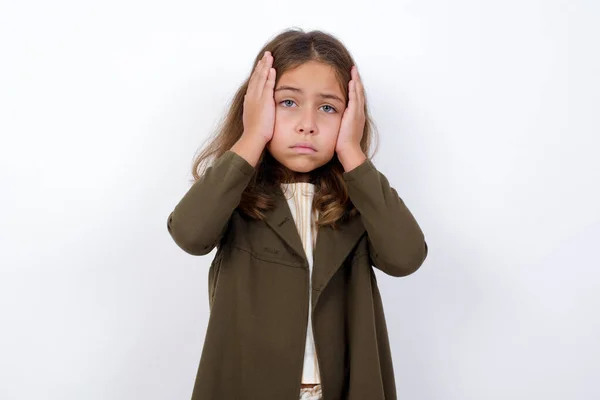 Portrait Beautiful Young Little Girl Standing White Background Holding Head Royalty Free Stock Photos