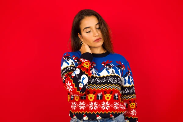 Caucasian Woman Wearing Christmas Sweater Red Wall Suffering Back Neck — Stock Photo, Image