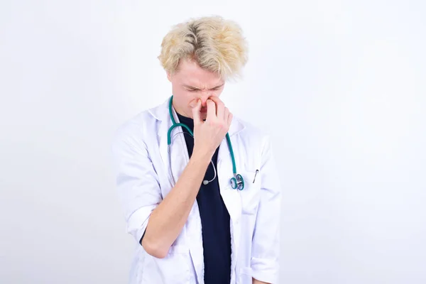 Doctor Holding His Nose Because Bad Smell — Stock Photo, Image