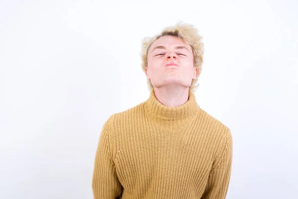 Handsome Caucasian Blond Man Standing White Background Keeps Lips Going — Stock Photo, Image