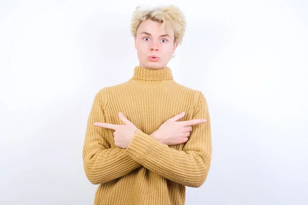 Confused Handsome Caucasian Blond Man Standing White Background Chooses Two — Stock Photo, Image