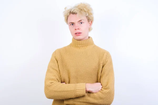 Handsome Caucasian Blond Man Standing White Background Frowning His Face — Stock Photo, Image