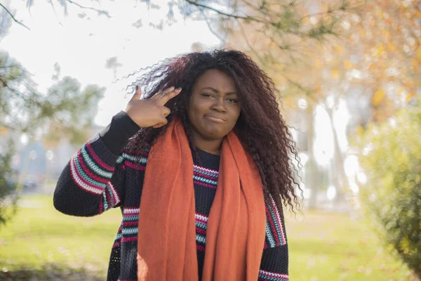 Young Beautiful African American Woman Wearing Sweater Scarf Gun Gesture — Stock Photo, Image