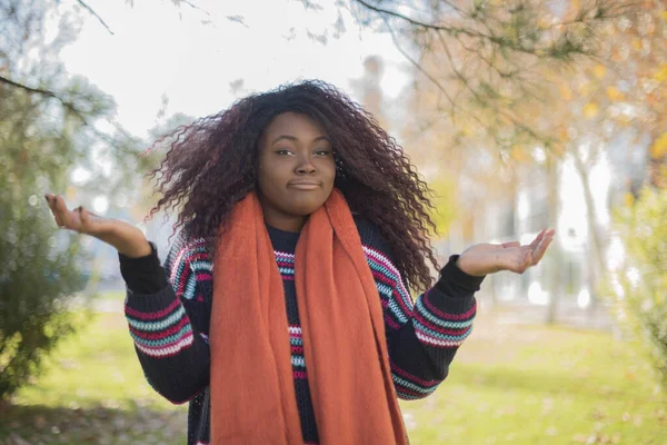 Young Beautiful African American Woman Wearing Sweater Scarf Showing Palms — Stock Photo, Image
