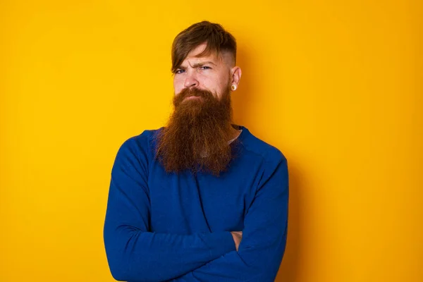 Handsome Red Haired Bearded Caucasian Man Standing Yellow Wall Frowning — Stock Photo, Image