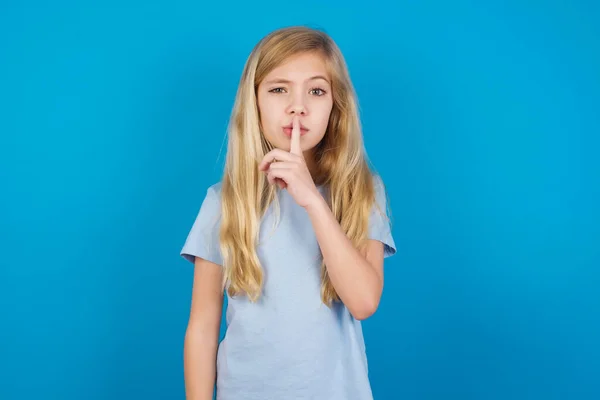 Beautiful Caucasian Girl Wearing Blue Shirt Makes Hush Gesture Asks — Stock Photo, Image