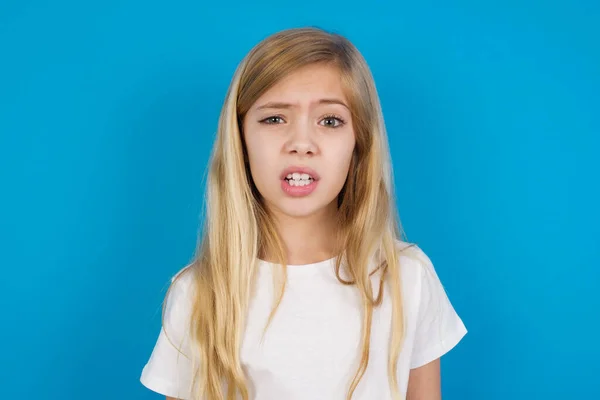 Portrait Dissatisfied Beautiful Caucasian Girl Wearing Shirt Smirks Face Purses — Stock Photo, Image