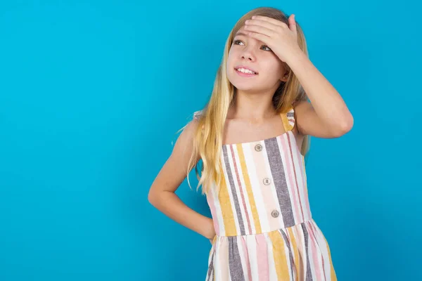 Beautiful Caucasian Girl Wearing Dress Touching Forehead Hears Something Surprising — Stock Photo, Image