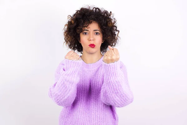 Displeased Annoyed Latin Woman Wearing Sweater Clenches Fists Gestures Pissed — Stockfoto