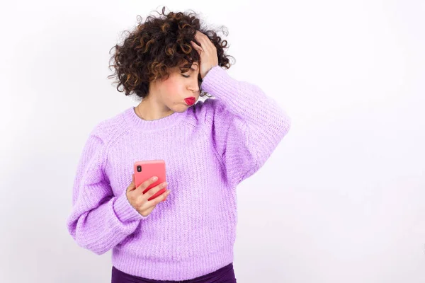 Dissapointed Young Pretty Woman Curly Hair Using Smartphone Posing White — Stock Photo, Image