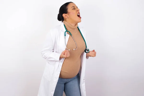 Pregnant Doctor Woman Excited Glad Achieve Victory Clenches Fists Screams — Stock Photo, Image