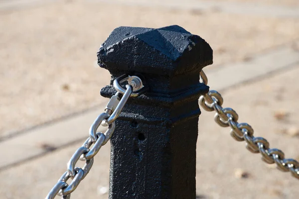 Chain fence hung on a pillar steel — Stock Photo, Image