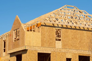 rafters and walls of a plywood house new woodwork work