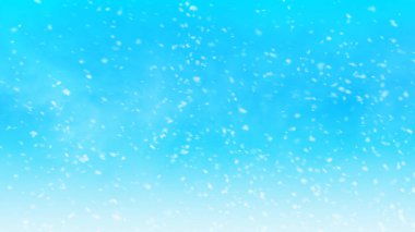 Mavi gökyüzü arka planlı Noel kar taneleri.