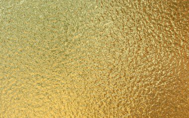 Altın folyo kağıt dokusu arkaplanı.