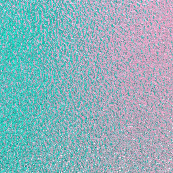 グリーンピンク色の箔紙の質感の背景 — ストック写真