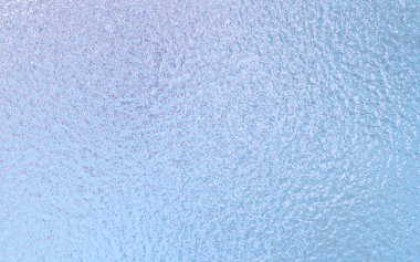 Açık mavi folyo kağıt dokusu arkaplanı.