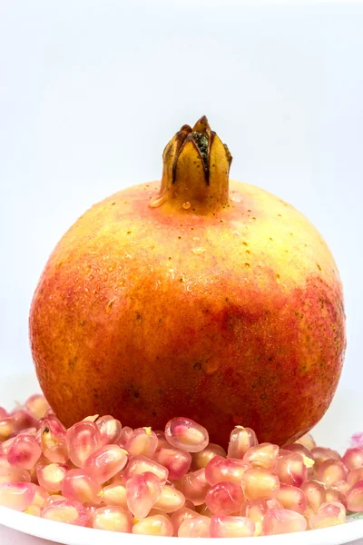 Fresh pomegranate on white background — Stock Photo, Image