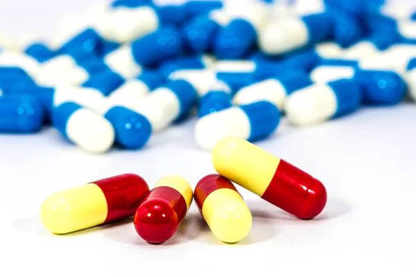 Capsule of medicine on white background — Stock Photo, Image