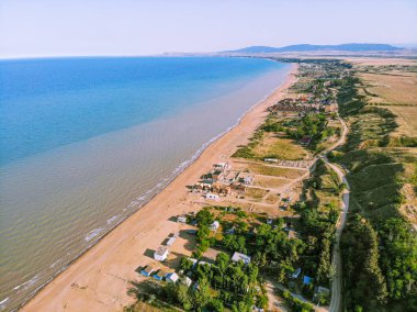 Caspian sea coast near Manas clipart
