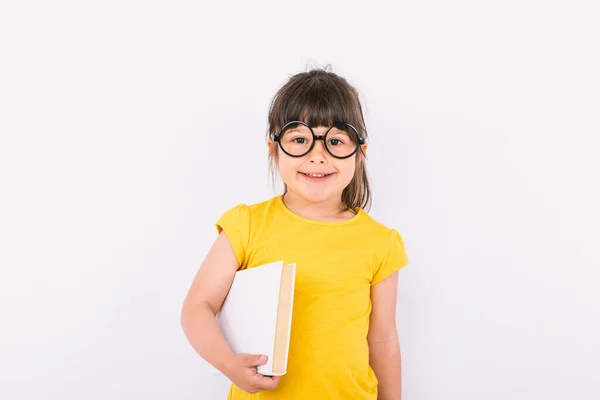 Smiling Little Girl Wearing Yellow Shirt Black Glasses Holding Book — Stock Photo, Image