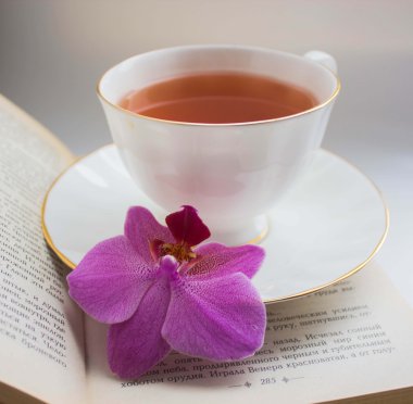 Orchid and a cup of tea