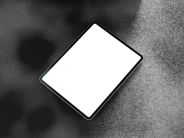 Yumuşak ışık ve gölgeli kenarları vurgulayan siyah arkaplan üzerindeki minimalist tablet ekranı.