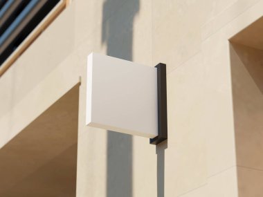 Açık yüzey üzerinde parlak siyah montu olan beyaz kare işareti.