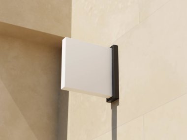 Pürüzsüz bej duvarda şık asılı logo işareti.