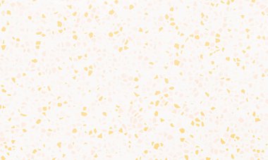 Beyaz ve yumuşak turuncu parçaları etrafa saçılmış parlak sarı terrazzo mermeri..