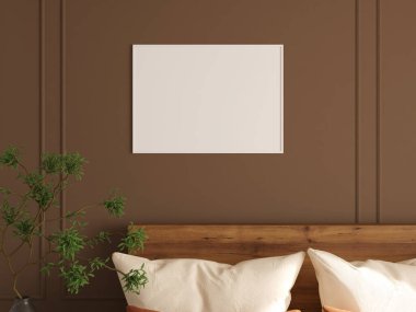 Yatak odasının duvarında yumuşak yastıklar ve zeytin ağacıyla renksiz fotoğraf çerçevesi..