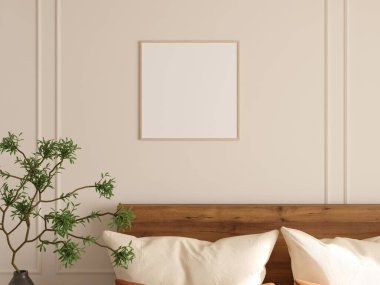 Yatak odasındaki kahverengi duvarda, yumuşak yatak ve bitkilerle çerçevelenmiş bir fotoğraf modeli..