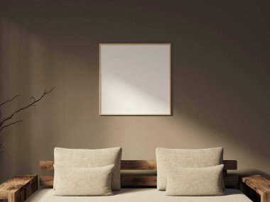 Kare ahşap çerçeve, sıcak topraksı bir yatak odası duvarında maket.