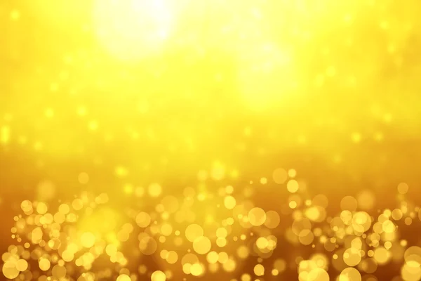 Onscherpe Golden Bokeh achtergrond met sparkles en glitter. Gouden — Stockfoto