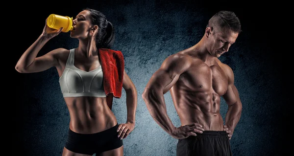 Athletic man and woman after fitness exercise